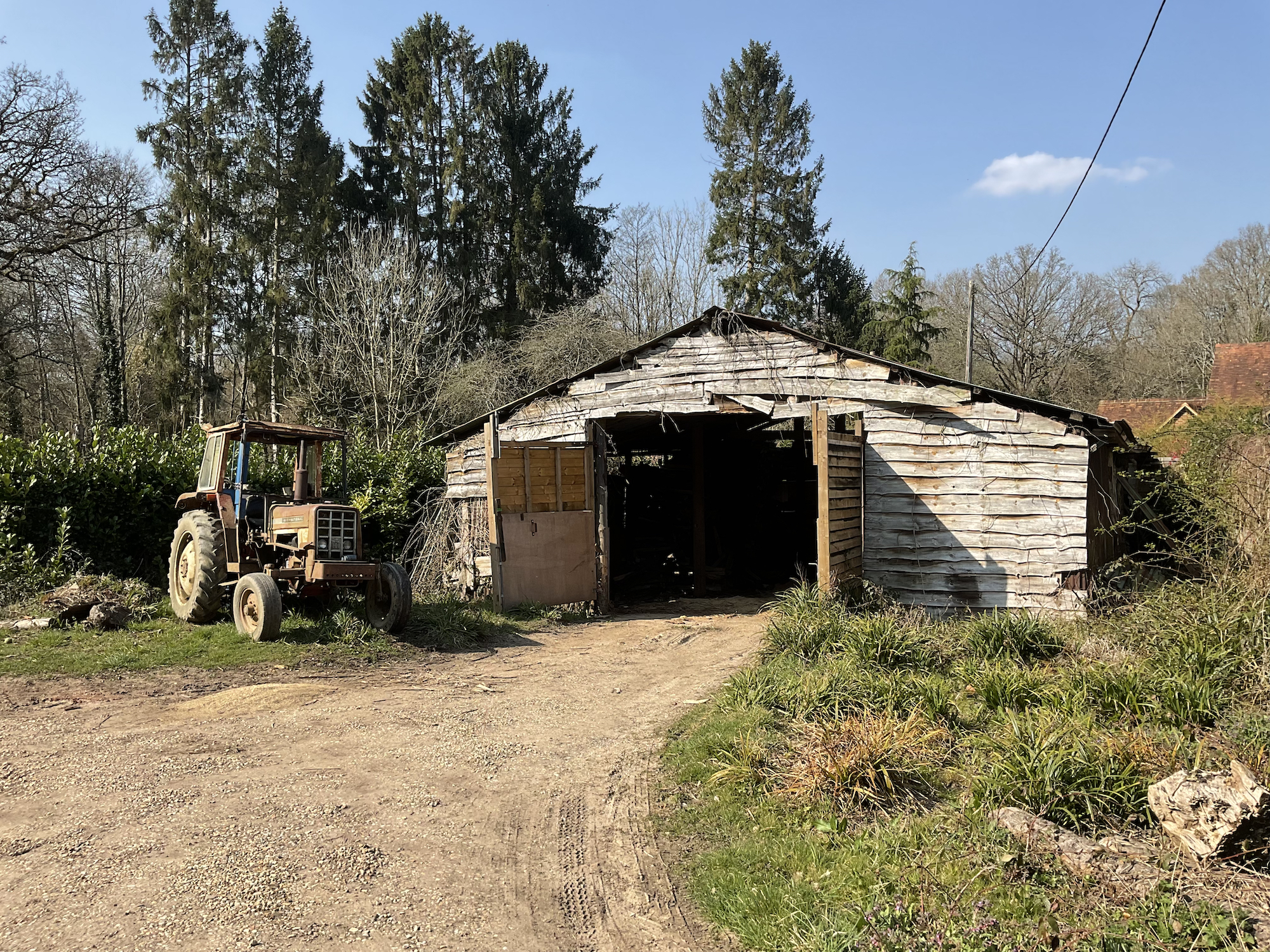 iPad Air 5 photo of a barn and tractor.