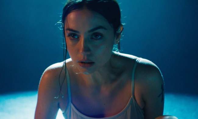 Ana de Armas crouches in Ballerina.
