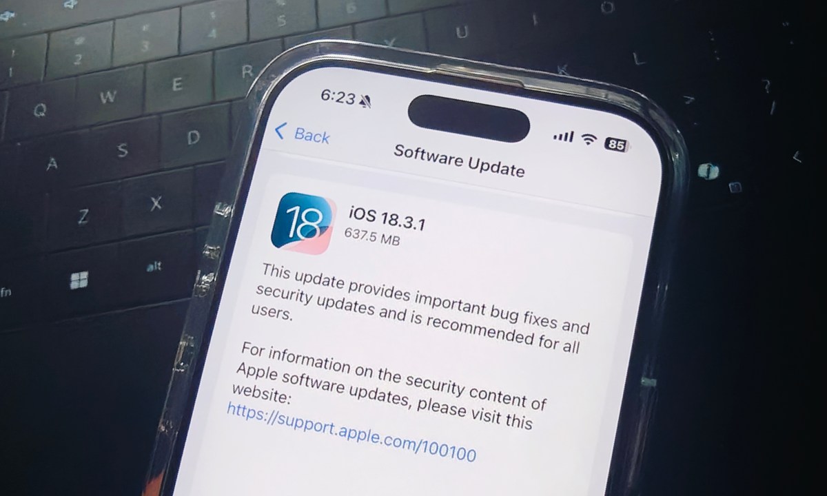 Installing iOS 18.3 update on an iPhone 16 Pro.