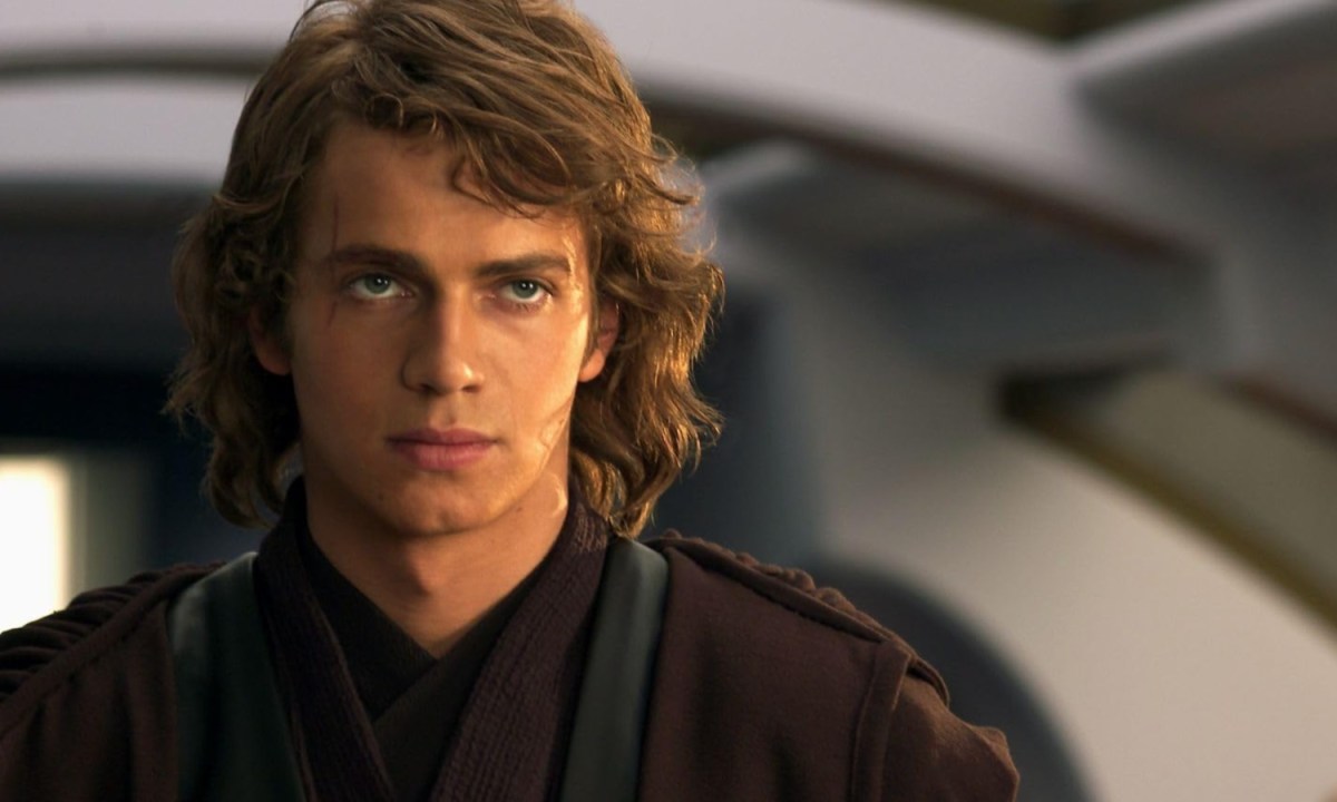 Anakin Skywalker stares with a stoic look.