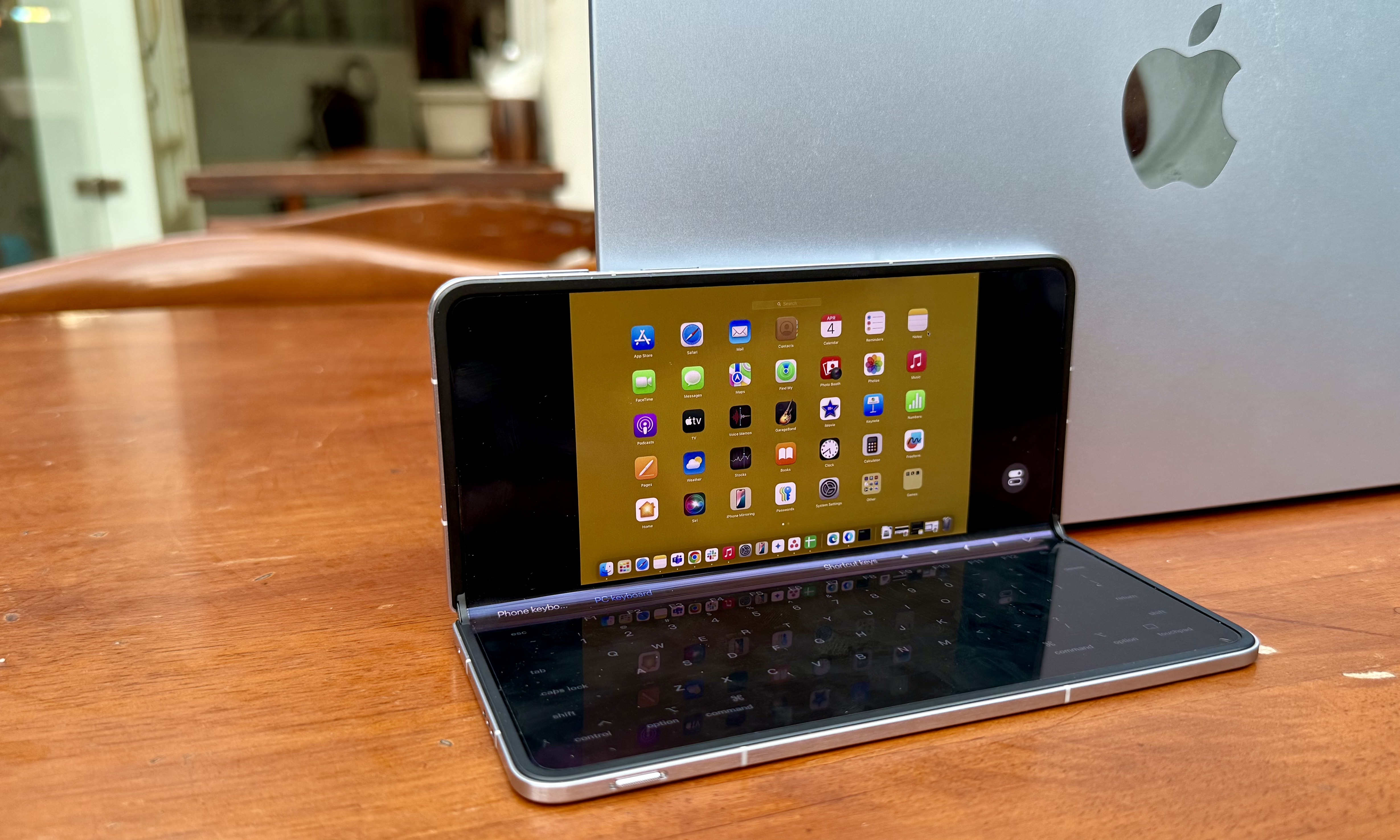 Remote Mac access is happening via an Oppo Find N5 device.