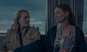 June and Serena with their babies sitting on a train looking at one another in The Handmaid's Tale.