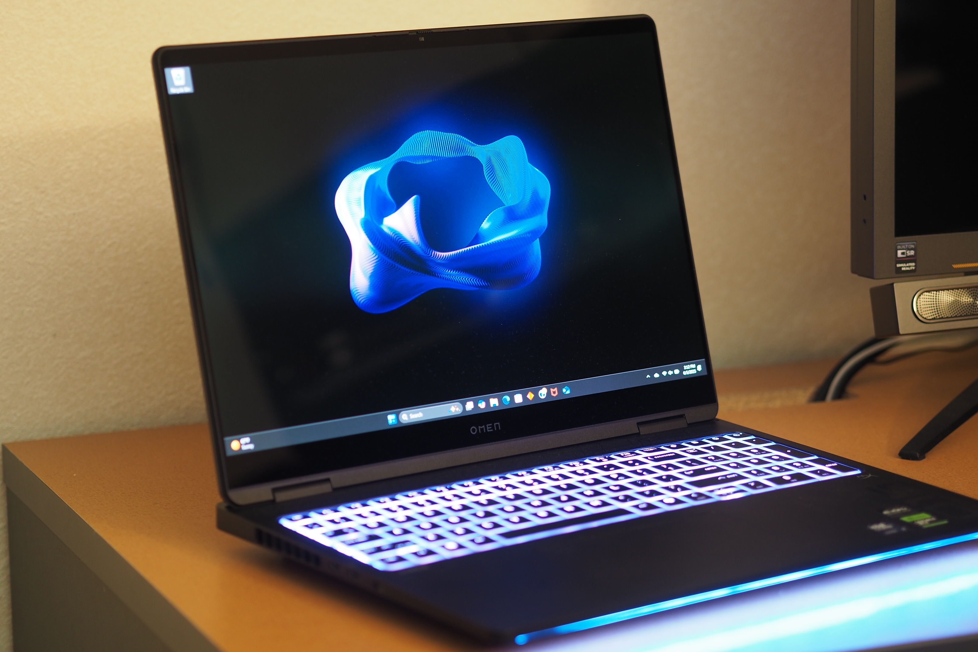 HP OMEN Max 16 front angled view showing display and keyboard.